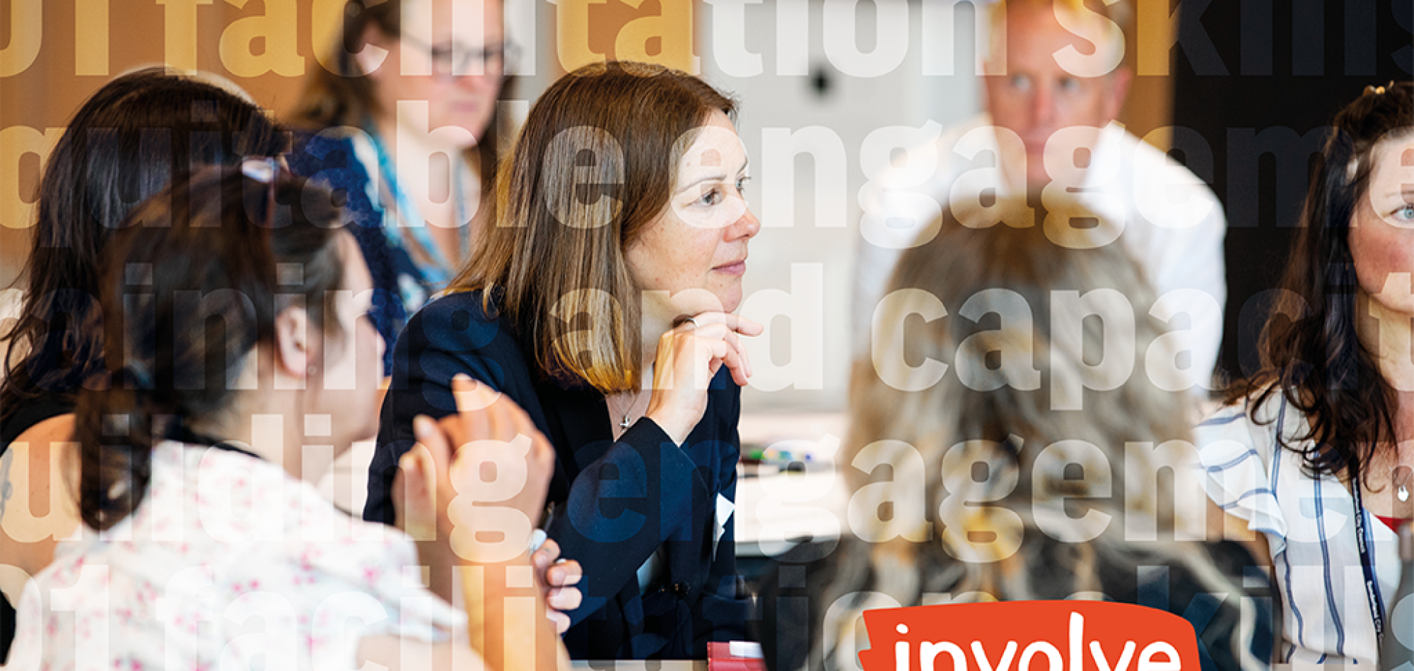 Pattern created with words like public engagement and capacity building in front of an image of people sitting.