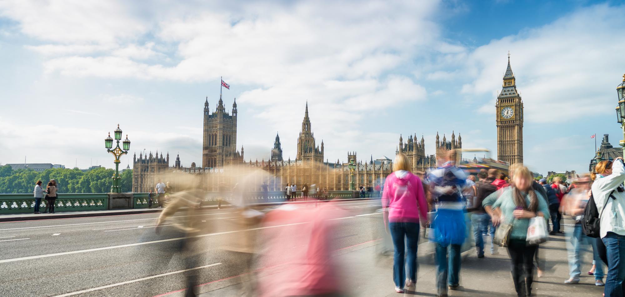 Westminster Bridge with people walking