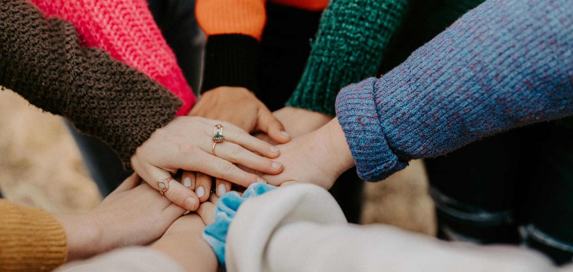 Hands coming together