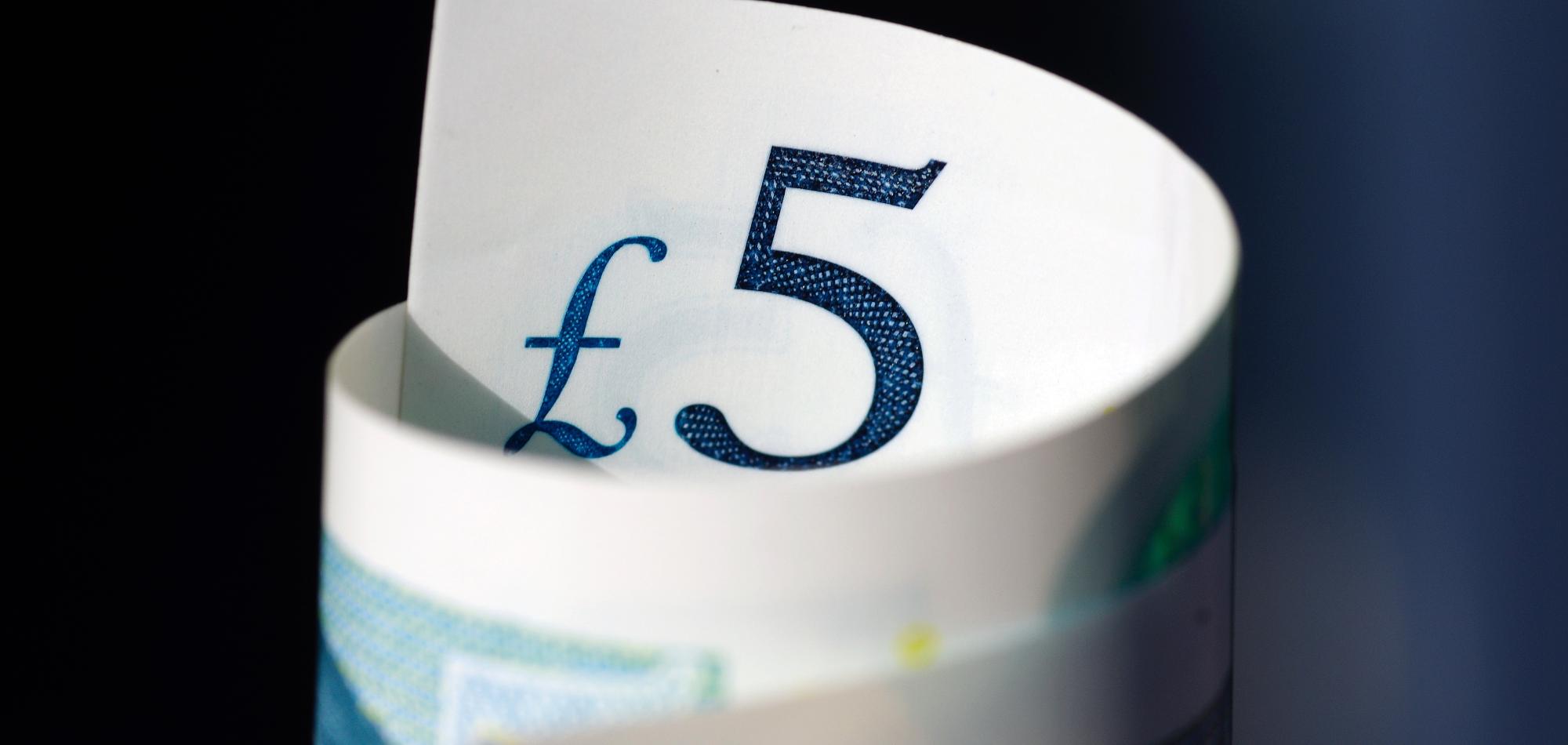 Image of five pound note.