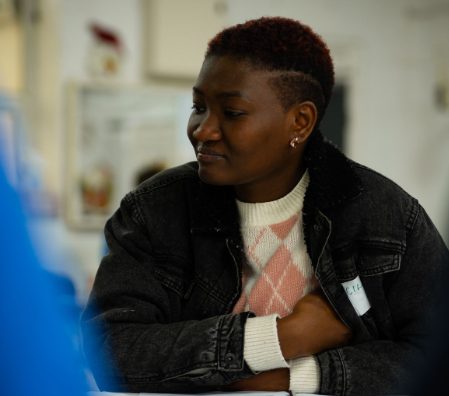 Person sitting and listening